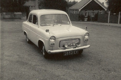 0511963-2-Your-Hosts-first-car-a-Ford-Anglia-2852-EV.-051