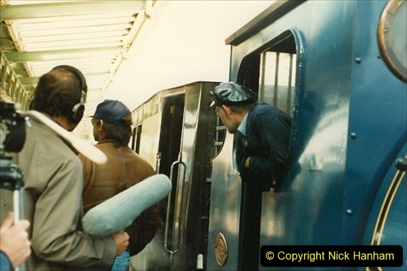 1987-09-30-Your-Host-driving-a-special-film-unit-train.-This-was-the-first-passenger-train-to-Quarr-Farm-Crossing.-1-064