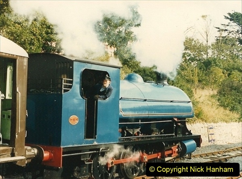 1987-09-30-Your-Host-driving-a-special-film-unit-train.-This-was-the-first-passenger-train-to-Quarr-Farm-Crossing.-2-065