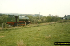 1121990-05-19-Making-progress-to-Corfe-Castle-driving-NCB-Whiston-on-a-works-train.-1-112