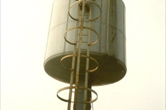1171990-06-14-Your-Host-driving-69621.-Checking-the-tower-for-water-level.-2-117