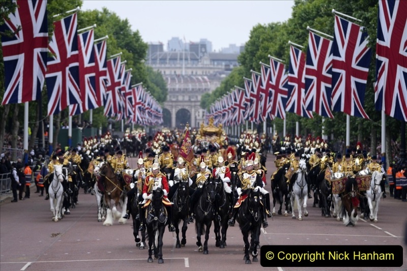 Soldiers parade during the Platinum Jubilee Pageant outside Buckingham Palace in London, Sunday, June 5, 2022, on the last of four days of celebrations to mark the Platinum Jubilee. The pageant will be a carnival procession up The Mall featuring giant puppets and celebrities that will depict key moments from the Queen Elizabeth II's seven decades on the throne. (AP Photo/Frank Augstein, Pool)