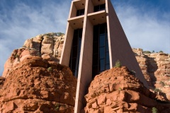 The Chapel of the Holy Cross is a Catholic chapel belonging to the Parish of Saint John Vianney and the Roman Catholic Diocese of Phoenix. It was built directly into a butte and offers a spectacular view of the valley 200 feet below.