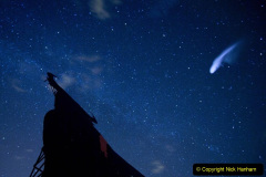 In this long exposure photo, a streak appears in the sky during the annual Perseid meteor shower above a roadside silhouette of a Spanish fighting bull, conceived decades ago in Spain as highway billboards, in Villarejo de Salvanes, central Spain in the early hours of Monday Aug. 12, 2013. (AP Photo/Paul White)