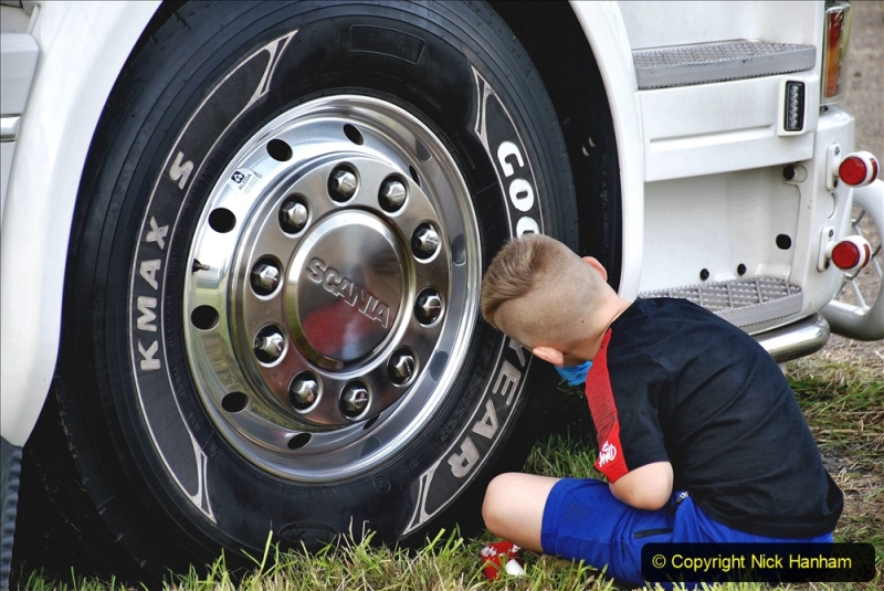 2020-09-05 Truckfest South West 2020 at Shepton Mallet. (306) This young lad was painting Good Year in white on the tyres. 306