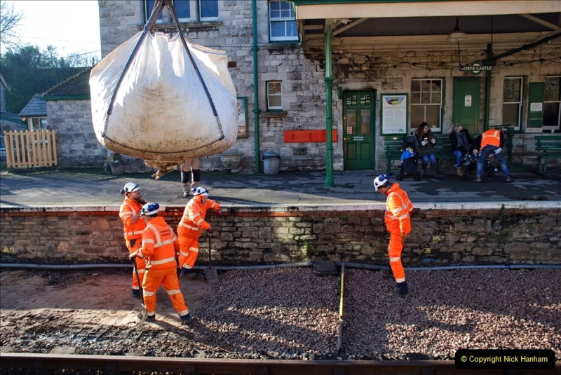 2022-01-13 Corfe Castle station track renewal DAY 4. (104) NO, the bag is not over the staff. OPTICAL ILLUSION. 103