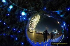 2019-12-09 Bournemouth Christmas Lights. (111) Your Host & Wife on reflection. 111