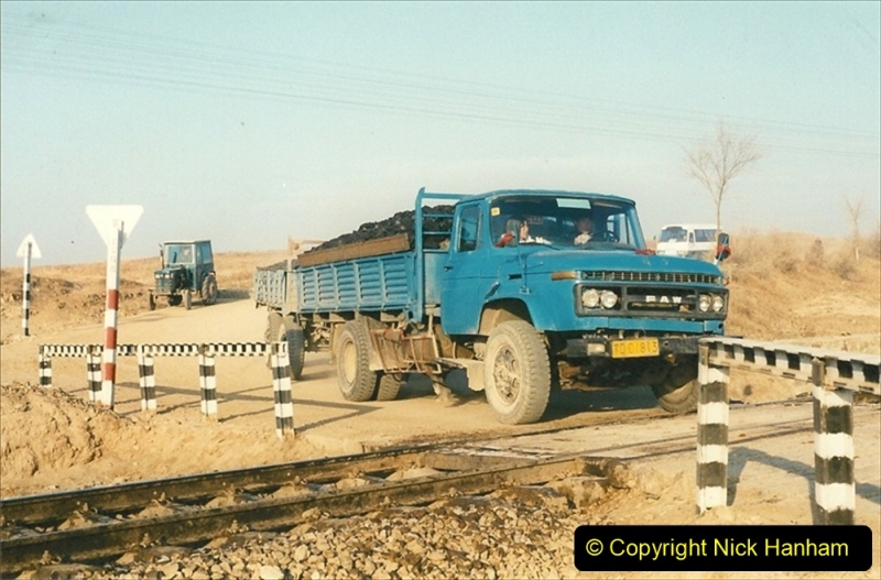 China 1997 November Number 1. (193) In 1997 nearly all trucks were painted in a standard blue. 193
