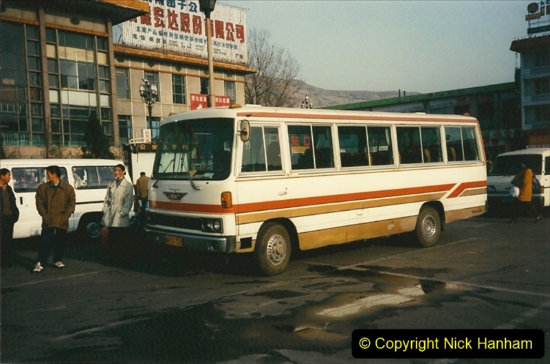 China 1997 November Number 2. (239) Leaving our Chengde Hotel for the station. 239