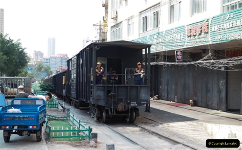 China & UK. (21)The Lanzhou branch in city limits with rare brake van. 021