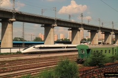 China & UK. (11) High speed EMU at Lanzhou -Xinjian railway. Track engineers coaches at right. 011