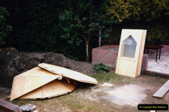 April 1990 Your Host alters the back garden. (32) Erecting Summer House. 32