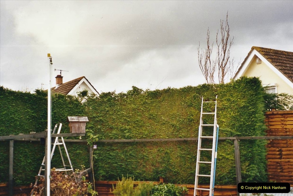 2002-Miscellaneous.-292-Your-Host-and-friend-Tony-lowering-my-house-hedge-height.-292